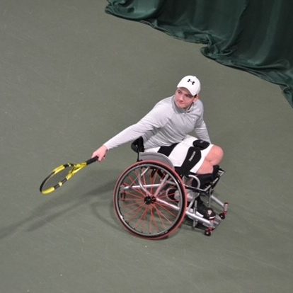 Wheelchair tennis star Andrew Penney in action on court and in training