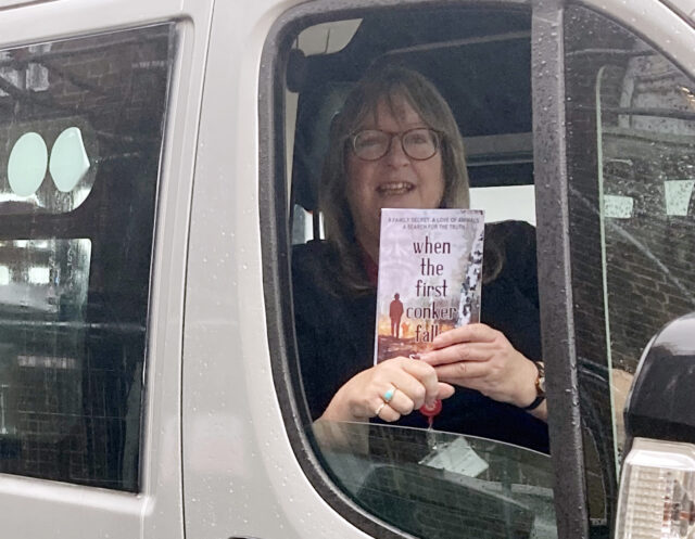 Richard Taunton Sixth Form College bus driver Sarah Davis with her debut novel When The First Conker Falls