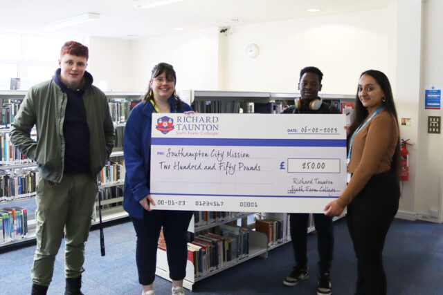 Vicky Mckillen from Southampton City Mission, second left, receives a cheque from Richard Taunton Sixth Form College students Marc Pickles-Veal, left, and Emmanuel Bhebhe and marketing apprentice Naveena Sohpaul